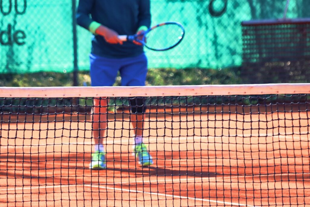 tennis ball, tennis player, tennis racket, athletic, tennis, sports, tennis net, tennis court, clay court, orange court, tennis player, tennis player, tennis, tennis, tennis, tennis, tennis, tennis net, tennis net, tennis court